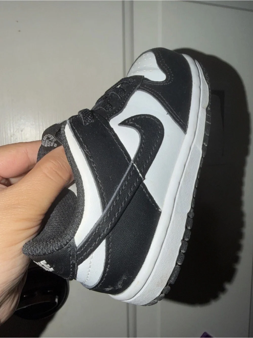 Nike Kids Black and White Low-Top Sneakers with Swoosh